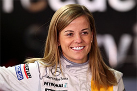 Susie Wolff celebrates getting an F1 test drive, using every means at her disposal