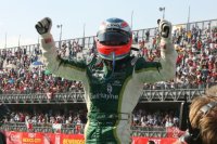 Adam Carroll at his best: celebrating victory with his face covered up.