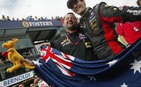 Mark Webber celebrates fifth place with Paul Stoddart and a cuddly kangaroo, Australia 2002.